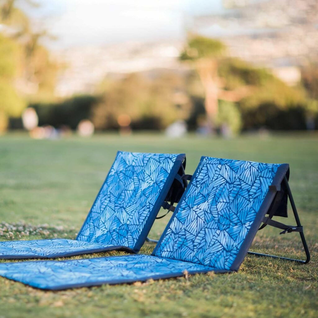 Two chairs in a grass field